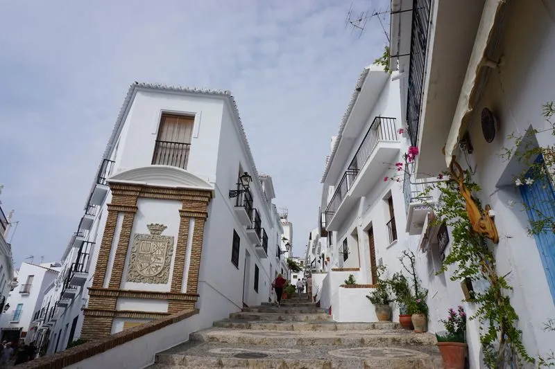Stepped lane lined with white houses in an Andalusian village