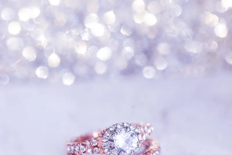 Gold, silver and rose gold bracelets on a marble tray