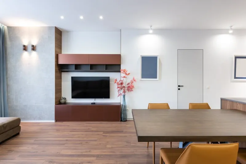 Distressing technique on white painted furniture revealing wood at the edges