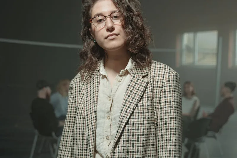 Collection of vintage luxury bags lined up on a display shelf