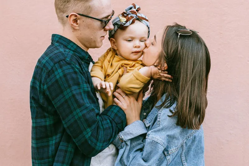 Mother holding newborn in skin-to-skin contact after birth