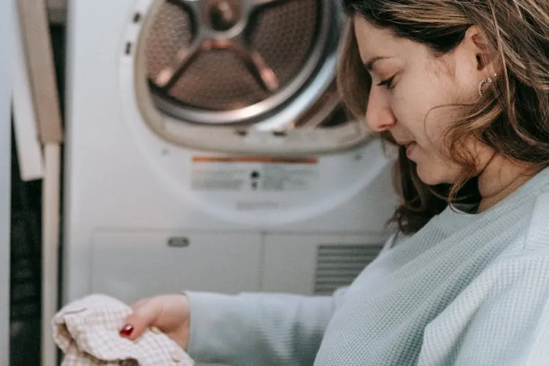 Positive pregnancy test held in hands