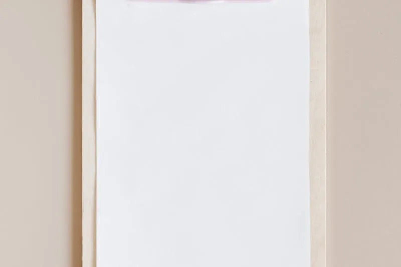 Wooden and silicone utensils in ceramic pot