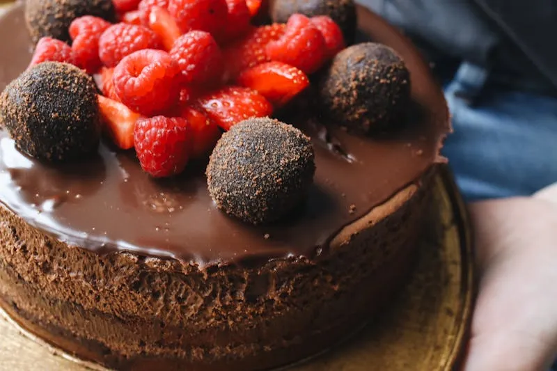 Decorated chocolate Yule log on serving plate