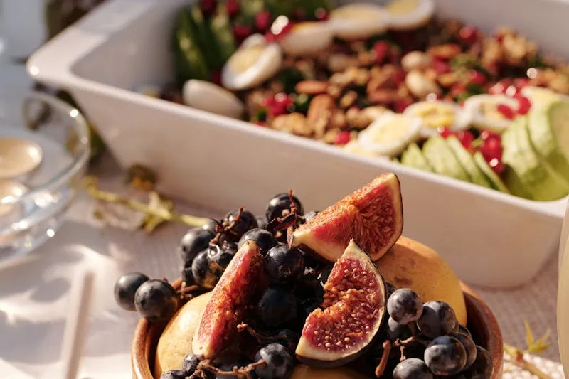 Eggs Benedict with hollandaise sauce on plate