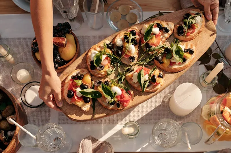 Brunch buffet decorated with plants and colourful tableware