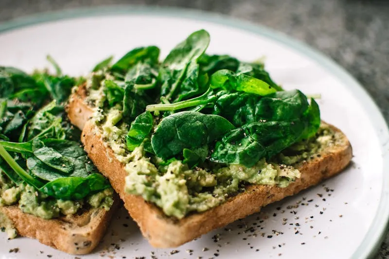 Topped toast on a wooden board