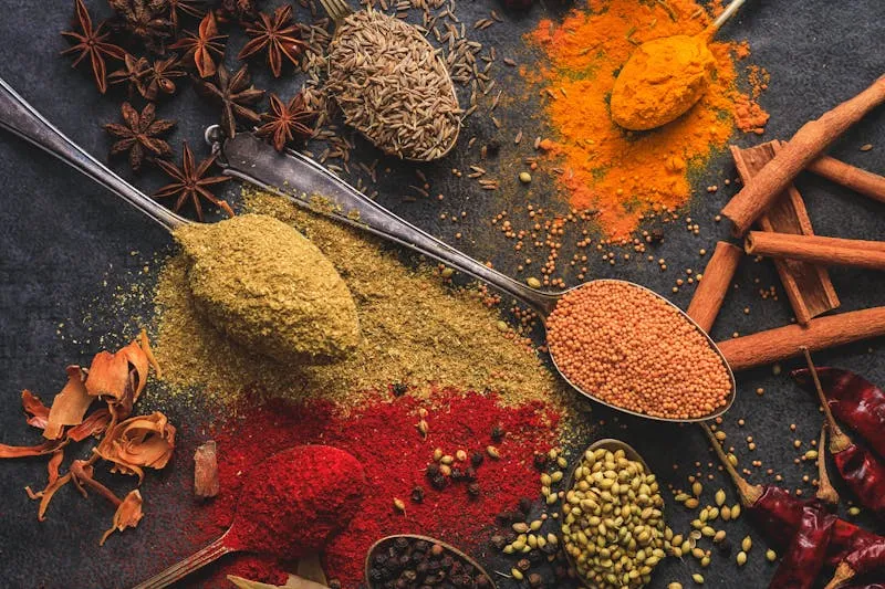Spices and condiments in small bowls