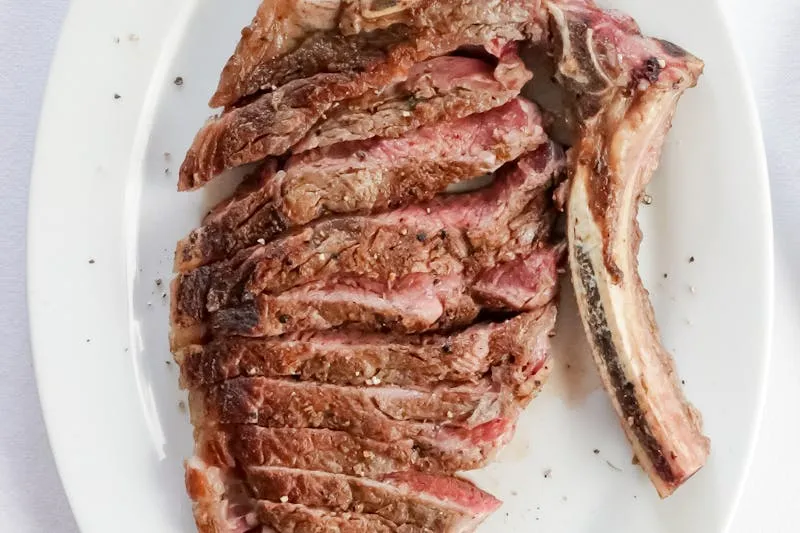 Sliced grilled lamb shawarma with tahini sauce