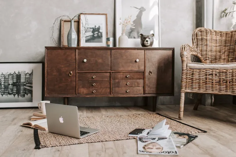 Feng shui desk with view of the door and plant to the side