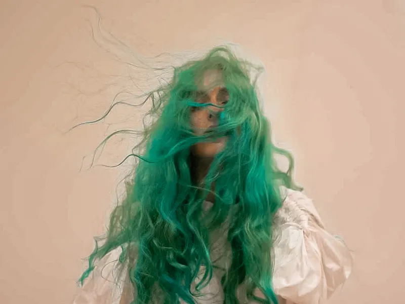 Blonde hair turning green in summer? Here's why it happens and how to fix it